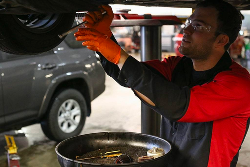 Man working on car